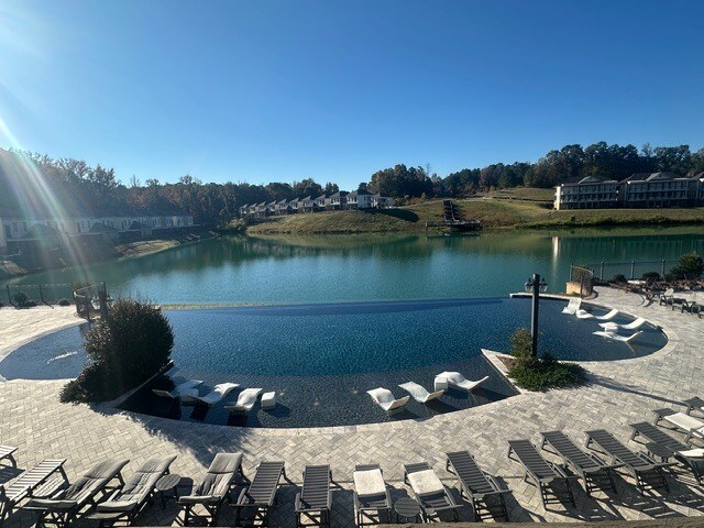 Gorgeous infinity pool overlooking well stocked lake