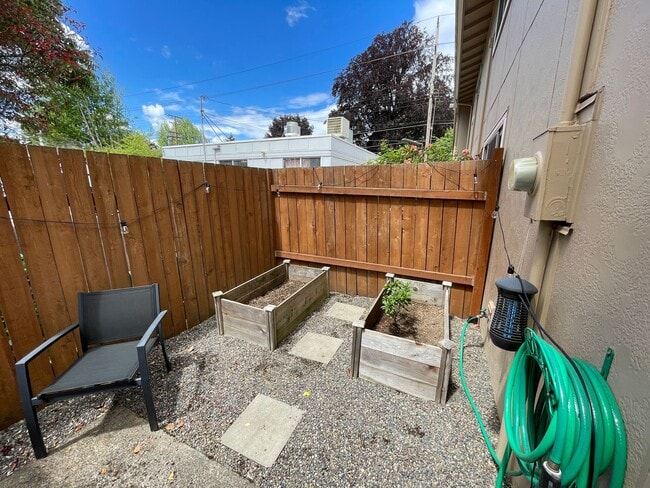 Photo - Stylish Corner Condo In Prime Location w/ Parking, Private Outdoor Space & W/D