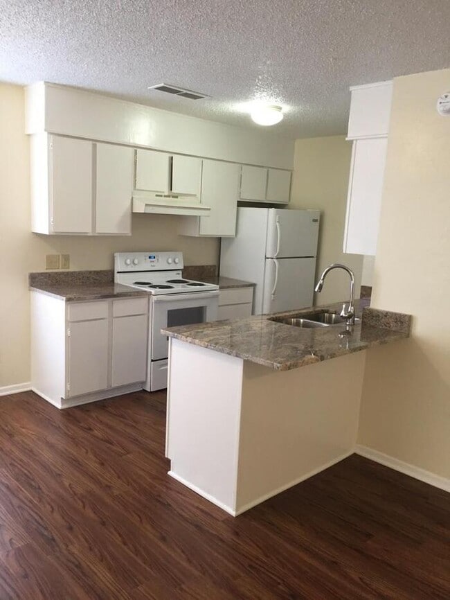 Photo - Available now. END 4PLEX TOWNHOME, 2 BR/1....