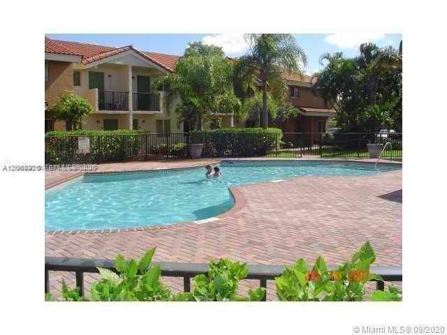 Photo - 560 NW 82nd Pl Unidad 305