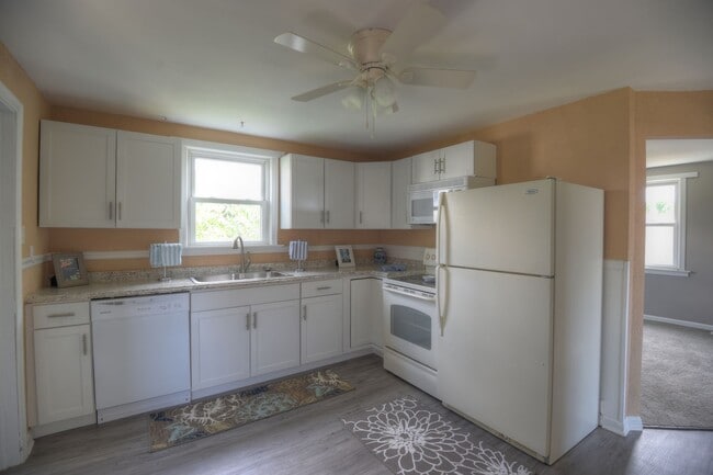 Photo - 2-Bedroom, 1-Bath Single-Family Home with Integral Garage and Renovated Interior for Rent
