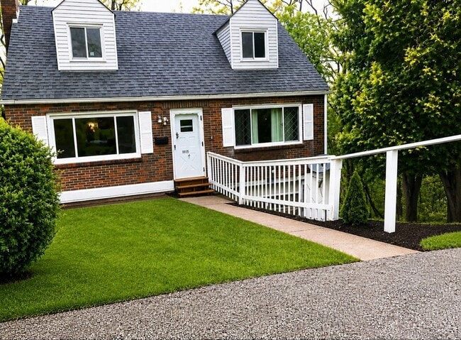 Building Photo - Charming 3-Bedroom Home with Hardwood Floors, Garage & Private Patio