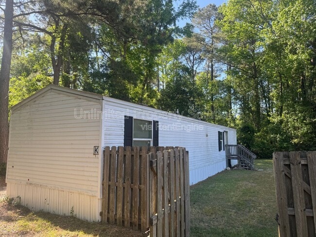 Building Photo - 9499 Wendi Dr NE Unit K