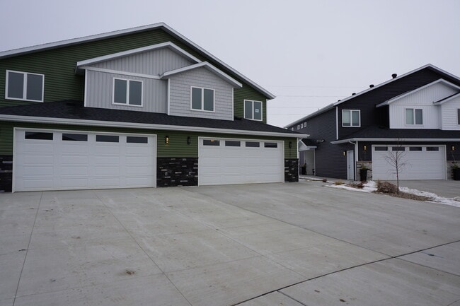Large driveway and two stall extra large garage (Photos are of similar unit with similar finishes.) - 3811 Stacy Drive Casa Adosada