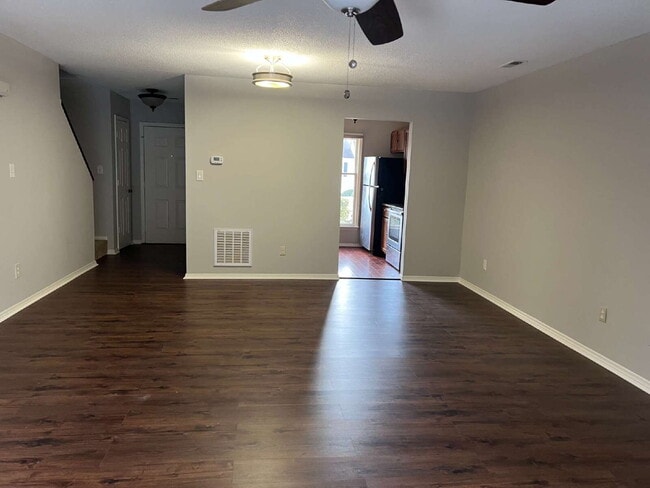 Photo - Charming 3 bedroom 2 bath townhome with lots of light and open downstairs. Galley kitchen, lots o...