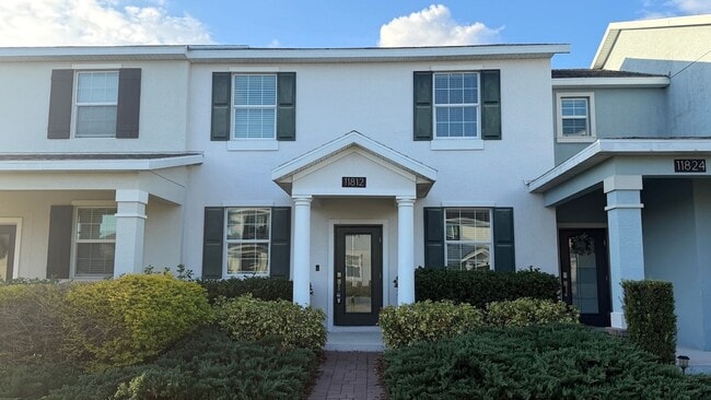 Building Photo - Immaculate 3/2.5 Townhome w/2-Car Garage in Storey Park of Lake Nona