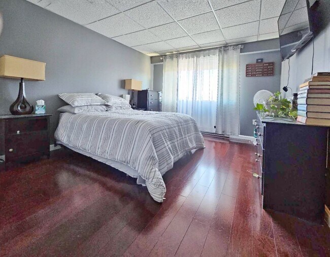 Photo - Large 1 bed 1 bath condo with elevator, washer and dryer in unit. assigned parking, well managed ...