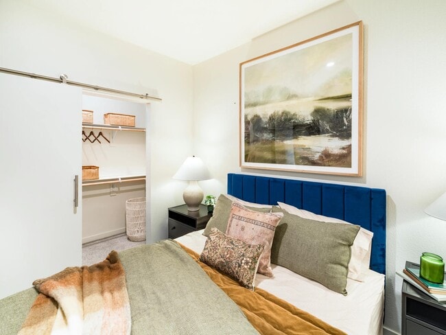 Designed for rest and recharge, this serene bedroom at Modera University Park features soft finishes, abundant natural light, and a setting moments from local dining and culture.