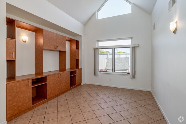 2BR, 1BA - 900SF - Living Room - 3139 Professional Dr