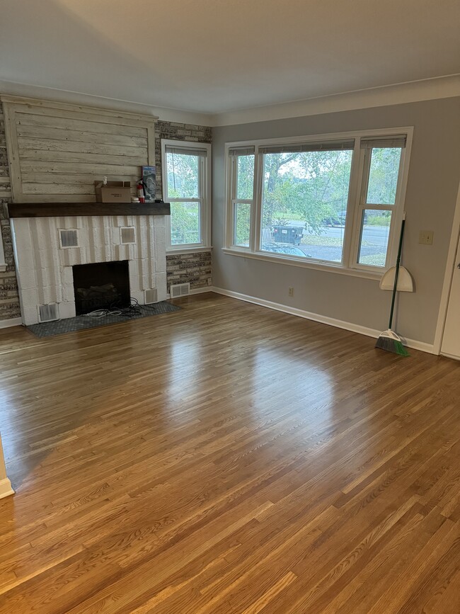 Newly Refinished Oak Flooring & Fireplace - 1160 Main St Apartments Unit 2