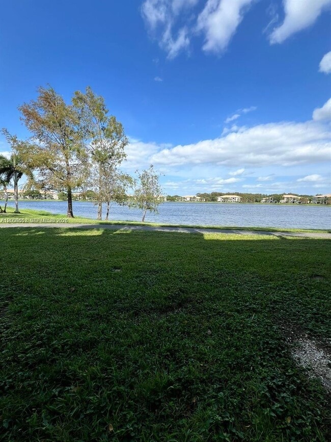 Building Photo - 5065 Wiles Rd Unit 103