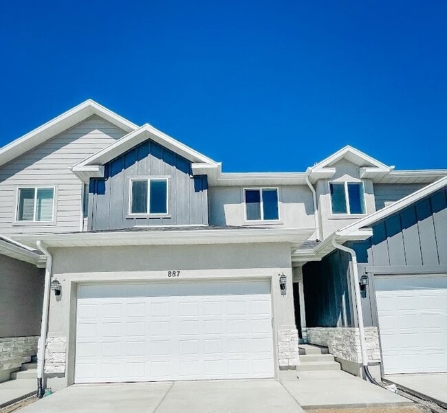 Building Photo - Brand New Idyllic Townhome in AF