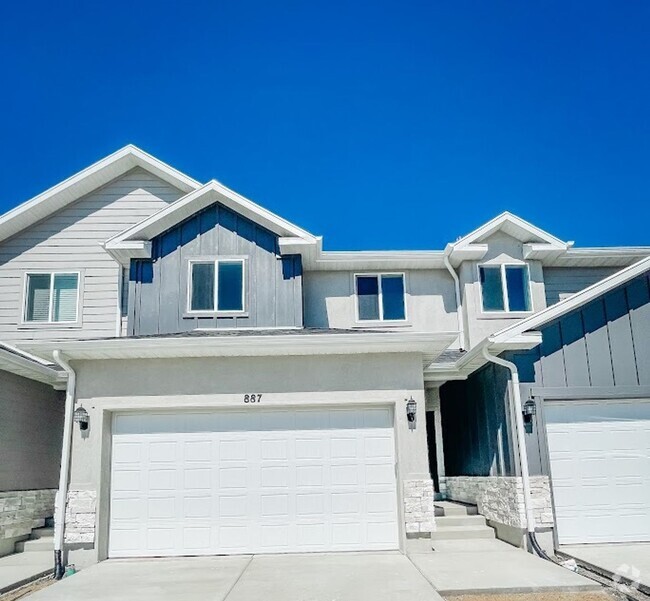 Building Photo - Brand New Idyllic Townhome in AF