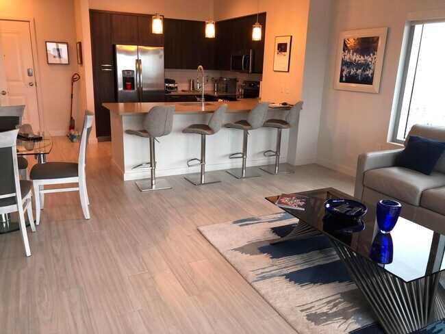 living room - 591 Evernia St Unit 2516