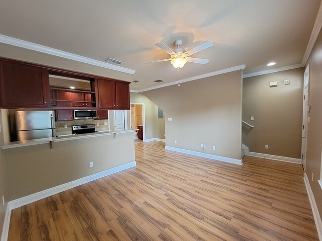 Photo - 3 Bedroom town home for rent August 6, 2026 in gated community with pool, renting for $1550 per m...
