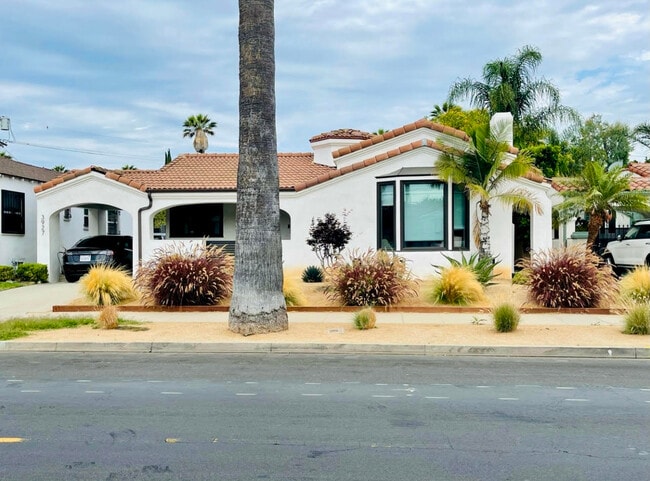 New white stucco and all new windows. - 3927 Degnan Blvd Rental