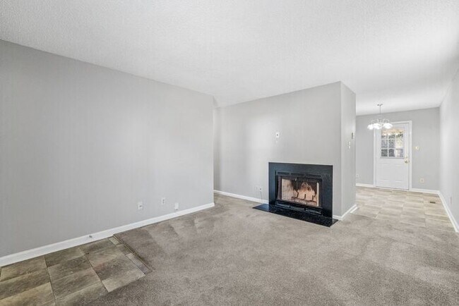 Photo - NE Home - Updated Kitchen and Bathrooms! SS Appliances, Fire Place, Front Porch & Deck, Fenced Yard!