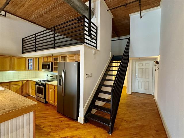 Building Photo - 3026 Commerce St Unit 205