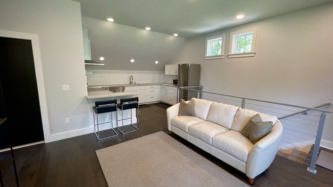 Living room looking towards open kitchen - 297 Durham Point Rd