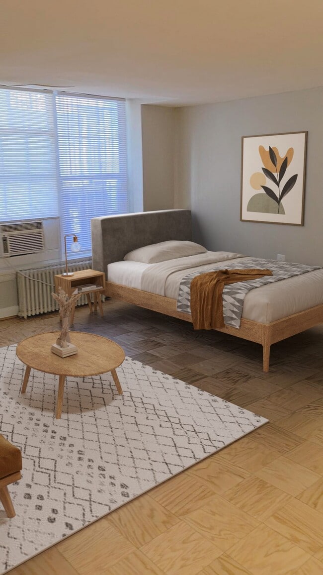 Studio living area (virtually staged)