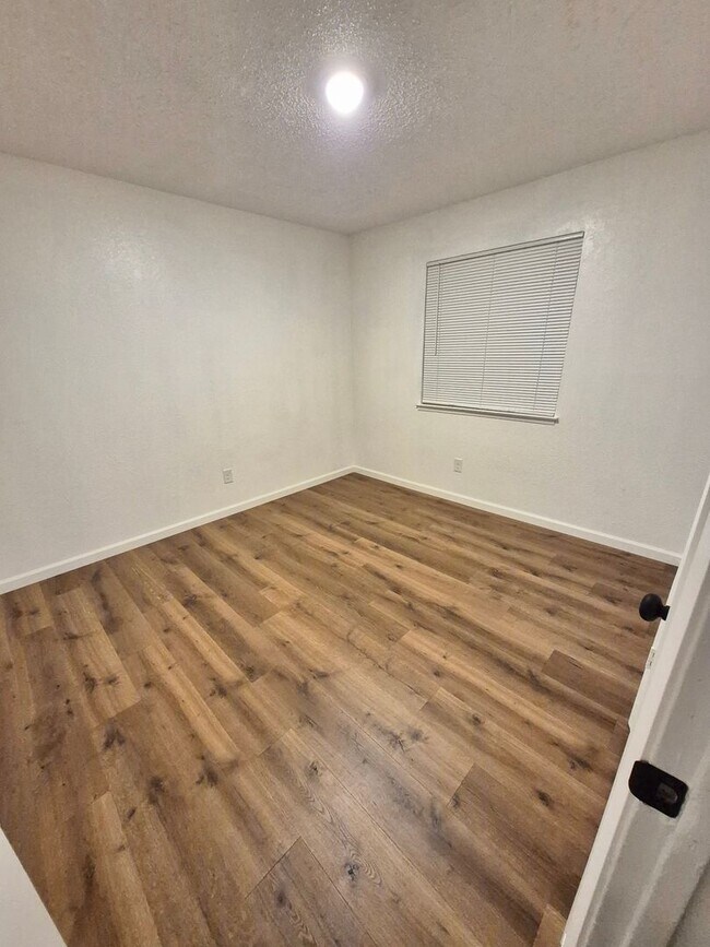 Photo - Charming 3-Bedroom Home with Large Backyard & One-Car Garage