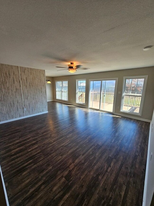 Photo - Spacious 3-Bedroom Home in Crossville with 2-Car Garage, Fenced Yard & Porches