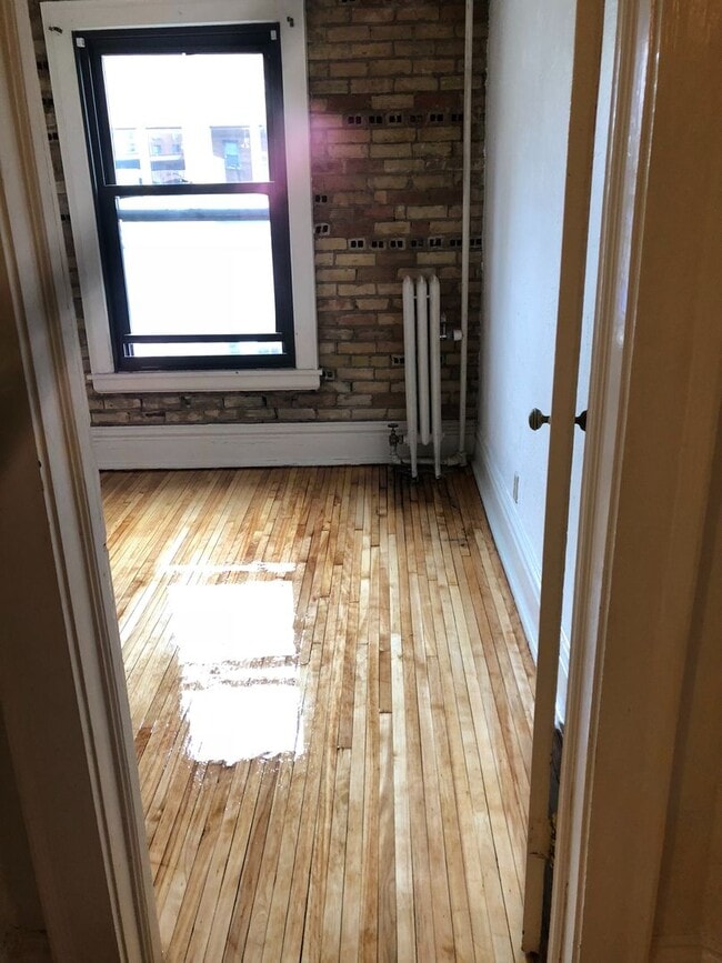 Photo - Downtown 2 bedroom Condo across from St. Thomas close to MCTC, UMN, MCAD . New hardwood floors