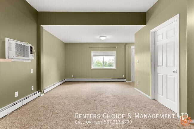 Photo - Main Floor 2 bedroom Unit With Onsite laundry, BONUS INCENTIVE