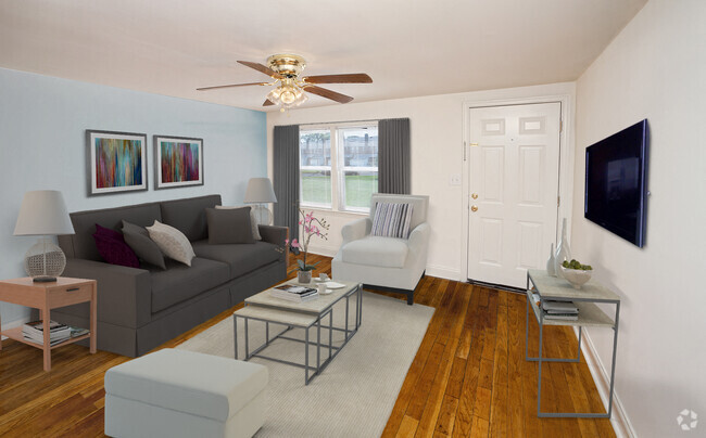 Spacious living rooms make entertaining easy. - Day Village Townhomes