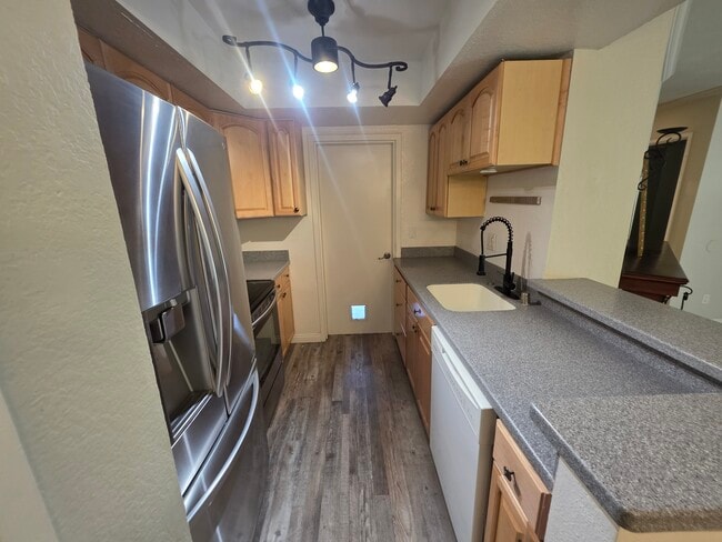 Kitchen leads to Garage - 2852 C St Unit 1