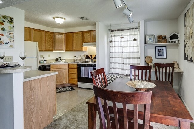 Kitchen and Dining Room at Ashmore Trace - Ashmore Trace