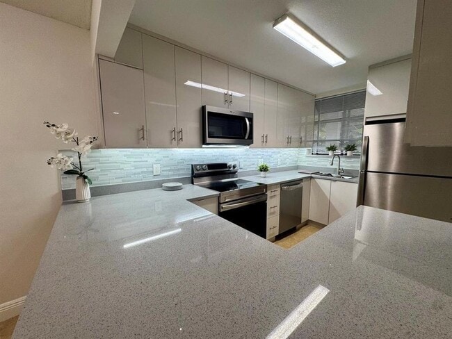 Building Photo - 1256 S Military Trail Unit 915