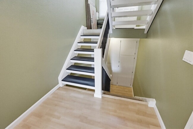 Photo - Welcome to this beautiful 1,042 sq. ft. condo offering modern comfort in a prime location! Unit B