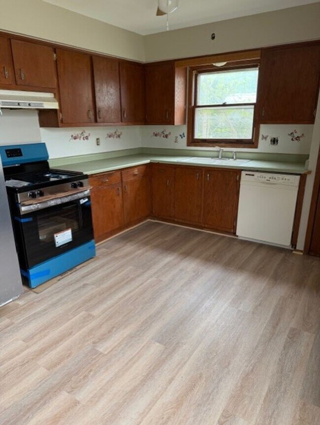 Photo - 7111-13 W Brentwood Ave Unidad 7111 W Brentwood Ave (Left Side)