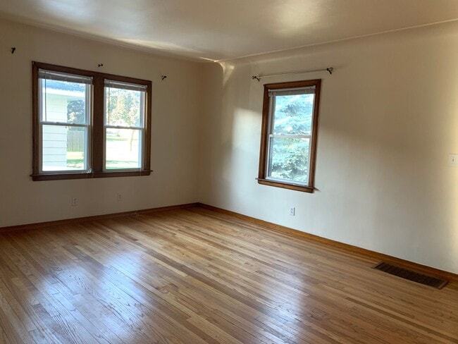 Photo - Three bedroom home with beautiful hardwood floors and central air!