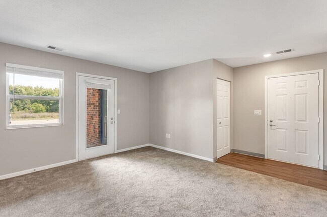 Enjoy versatile living spaces with natural light and convenient access to multiple rooms, professionally managed by Highlands Vista Group.