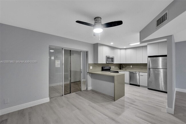 Building Photo - 5963 NW 25th Ct Unit 210
