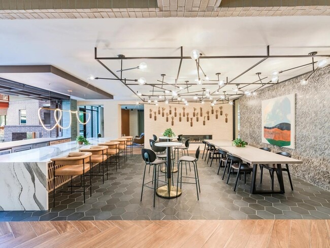 Connect and unwind in the social kitchen at Modera EaDo, designed for gathering and creating memories. - Modera EaDo