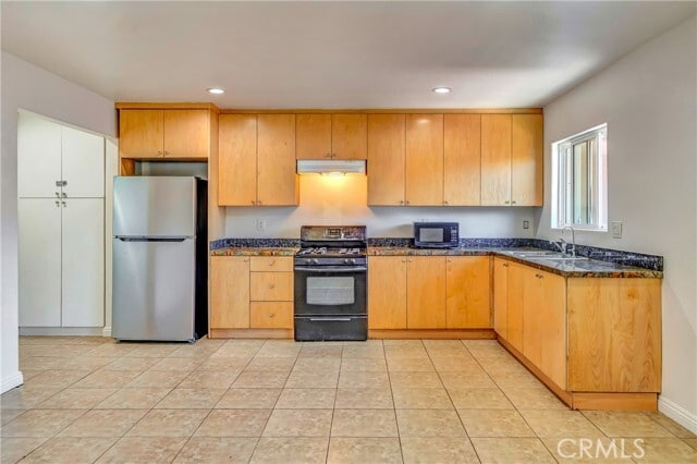 Building Photo - 6735 Elmer Ave Unit 19