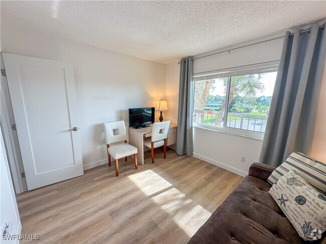 Building Photo - 4380 27th Ct SW Unit 311 Rental