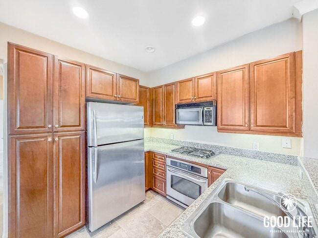 Building Photo - Bright 2BD/2BA Condo in Sabre Springs with Covered Balcony, In-Unit Laundry & Garage Unit 328