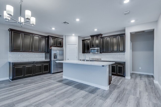 Photo - Like new, split-level, 3 bed, 2.5 bath, with bonus room & Strip views in West Las Vegas!