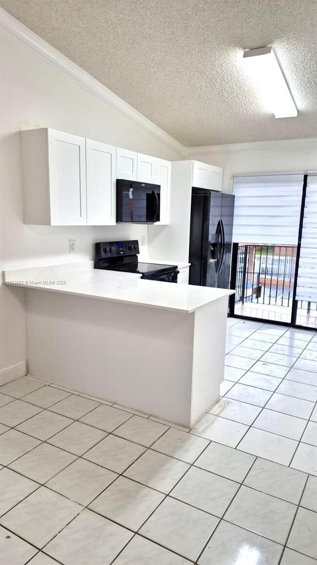 Building Photo - 7762 W 29th Way Unit 201 Rental