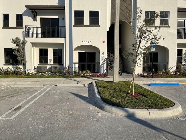 Building Photo - 15520 SW 136th St Unit 103