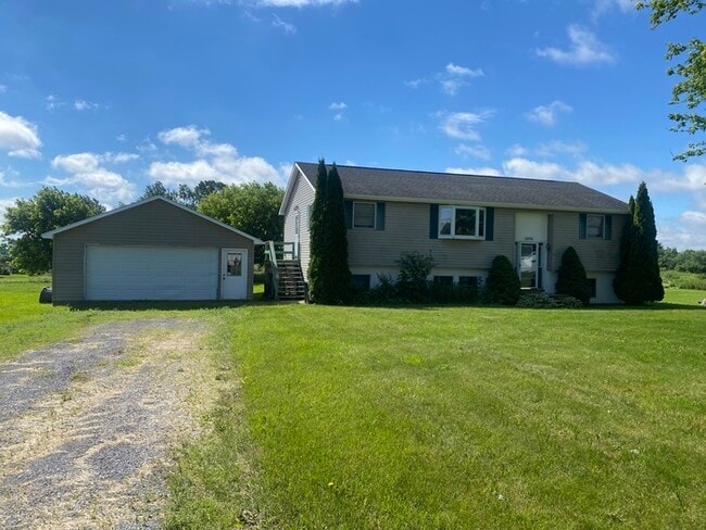 Building Photo - Beautiful secluded 4 bedroom 2.5 bath home with 2 stall detached garage and descent sized yard