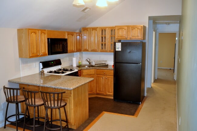 kitchen hallway to bathroom and bedroom - 128 College Ave Unit Cozy One Bedroom