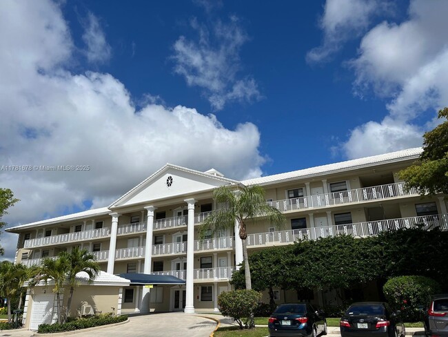 Building Photo - 3521 Village Blvd Unit 205 Rental
