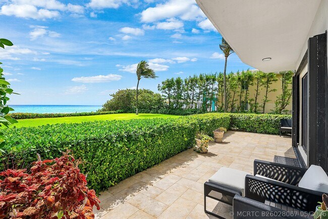 Building Photo - 3951 N Ocean Blvd Unit 101
