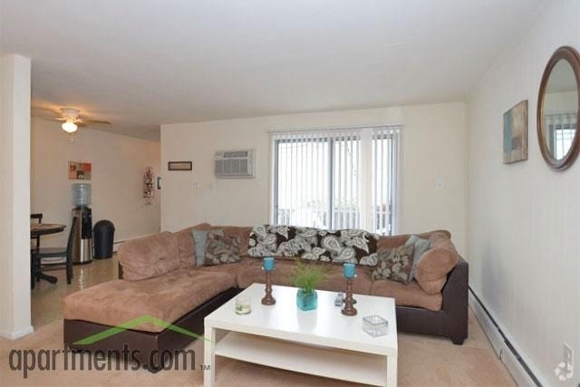 Living Room - Belmont Village Apartments