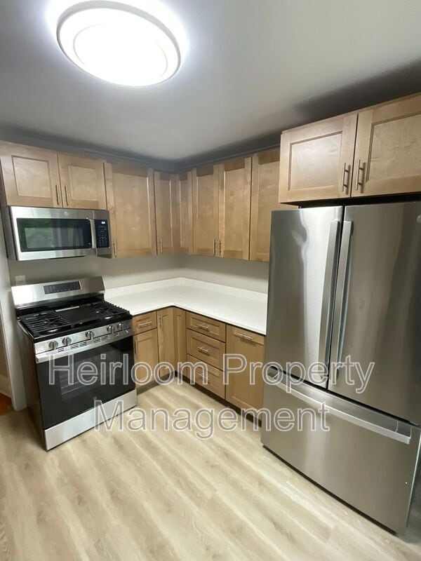 Building Photo - 601 Woodland Ave Unit Upper